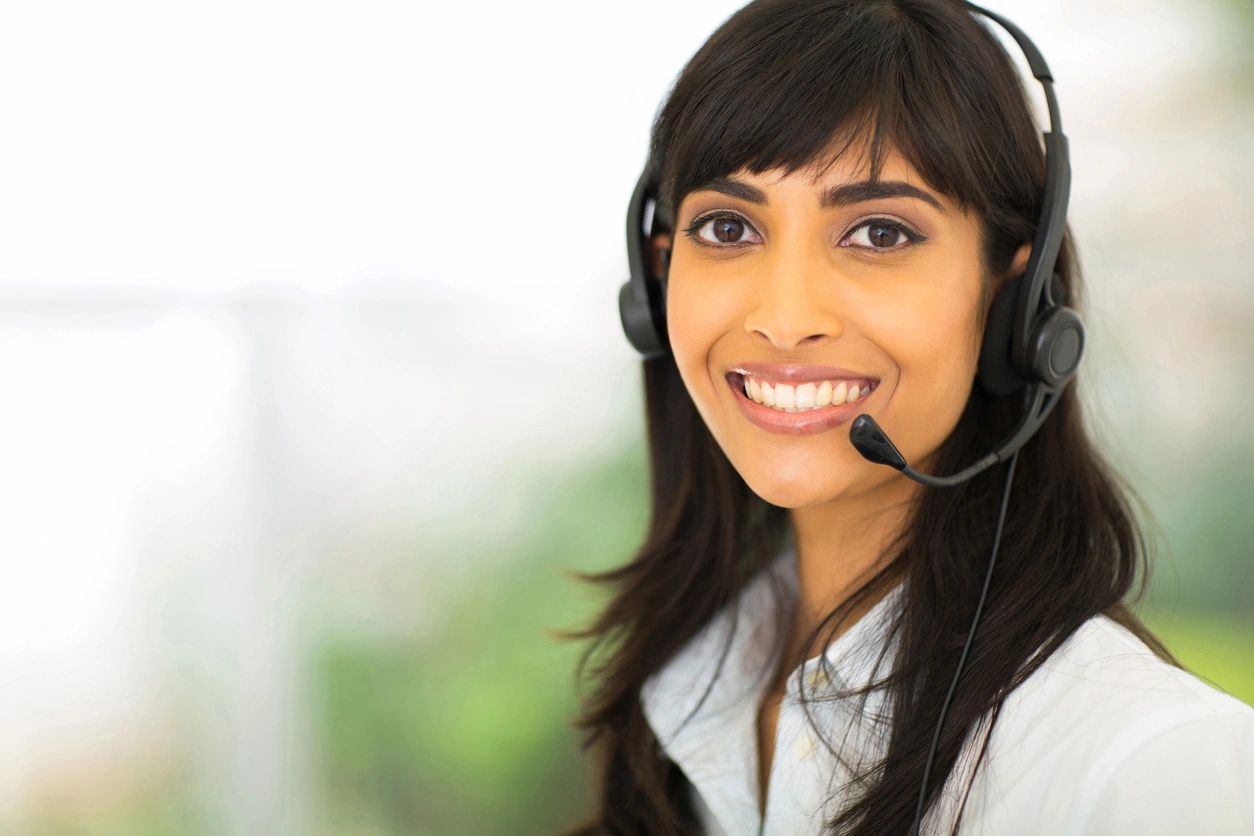 A professional representative answering the a call for home watch services in Rochester, NY.